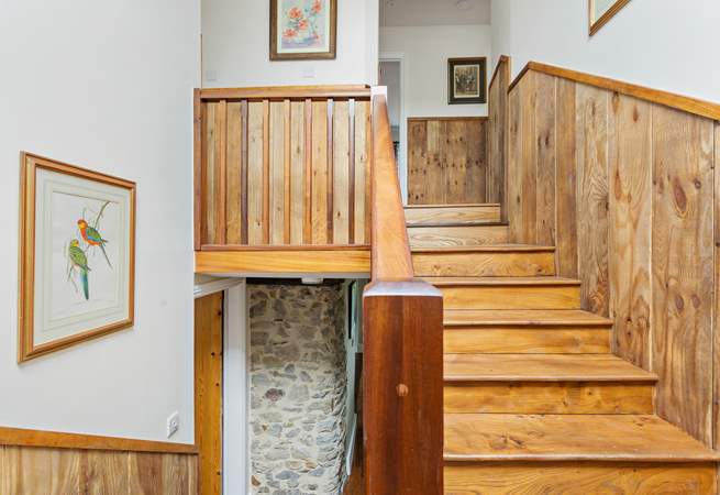 Head back through the open plan living area and up the main stairs to find a further four bedrooms.