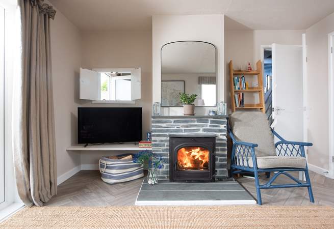 For out-of-season breaks or on a chilly evening, fire up the wood-burner and get cosy on the sofa, hot chocolate can be served at the hatch!