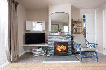 For out-of-season breaks or on a chilly evening, fire up the wood-burner and get cosy on the sofa, hot chocolate can be served at the hatch!