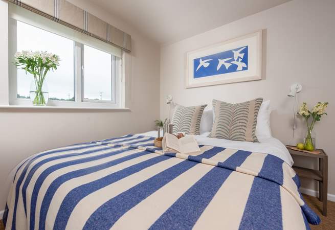 Bedroom one with king-size bed.