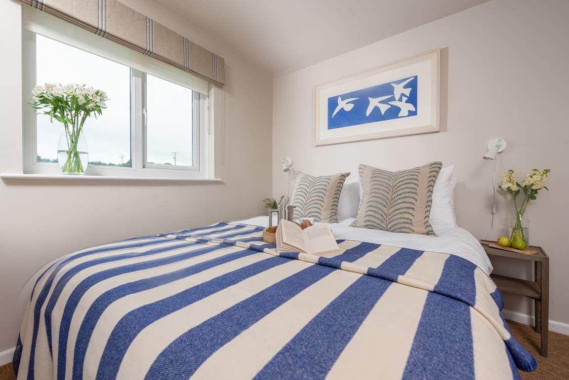 Bedroom one with king-size bed.