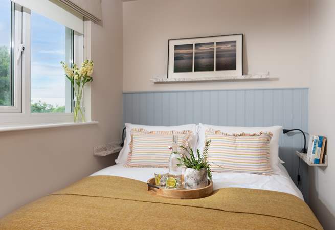 Bedroom three with double bed (four-foot six-inches). Guests may wish to note that this bed can only be comfortably accessed from one side and has limited space so more suited to one guest.