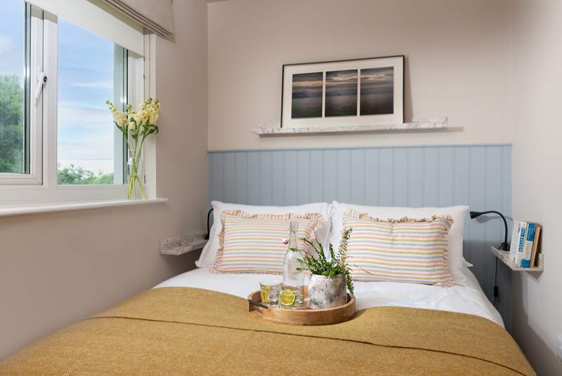 Bedroom three with double bed (four-foot six-inches). Guests may wish to note that this bed can only be comfortably accessed from one side and has limited space so more suited to one guest.
