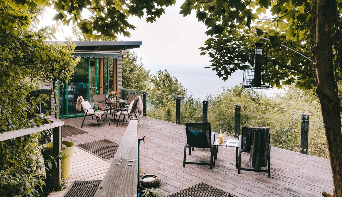 Wander through the trees and arrive at your romantic clifftop cabin.