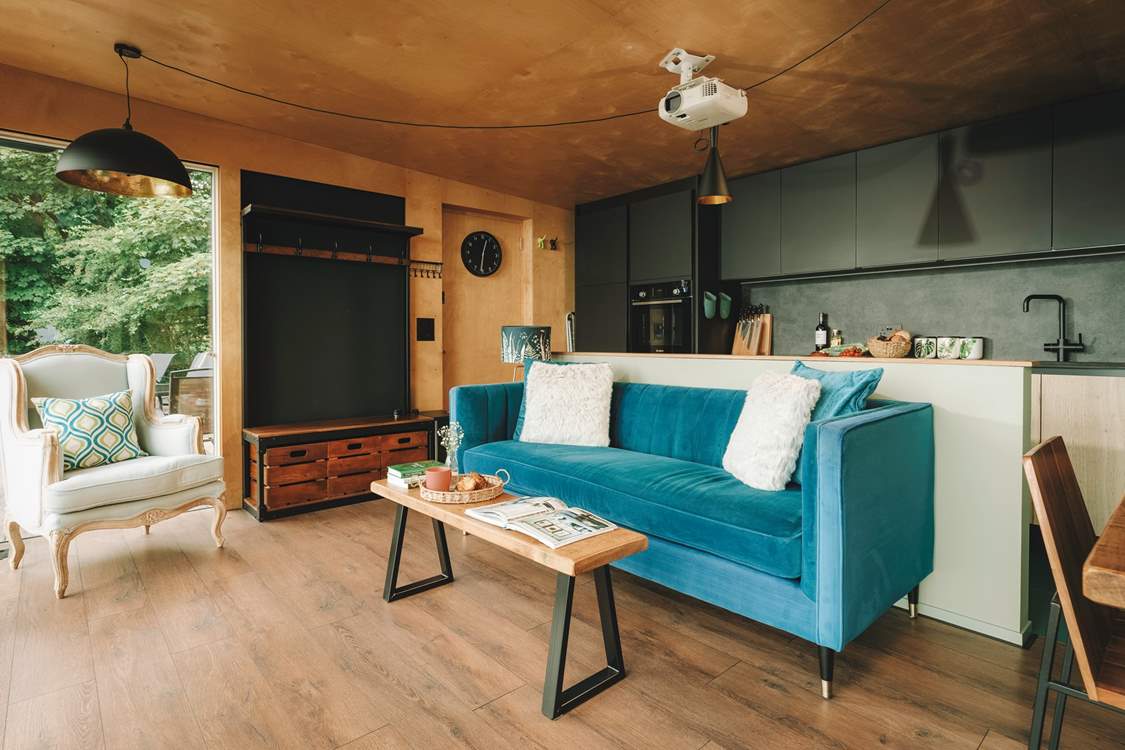 With a combination of dark and light tones and bespoke furnishings, the inside space is a work of art!