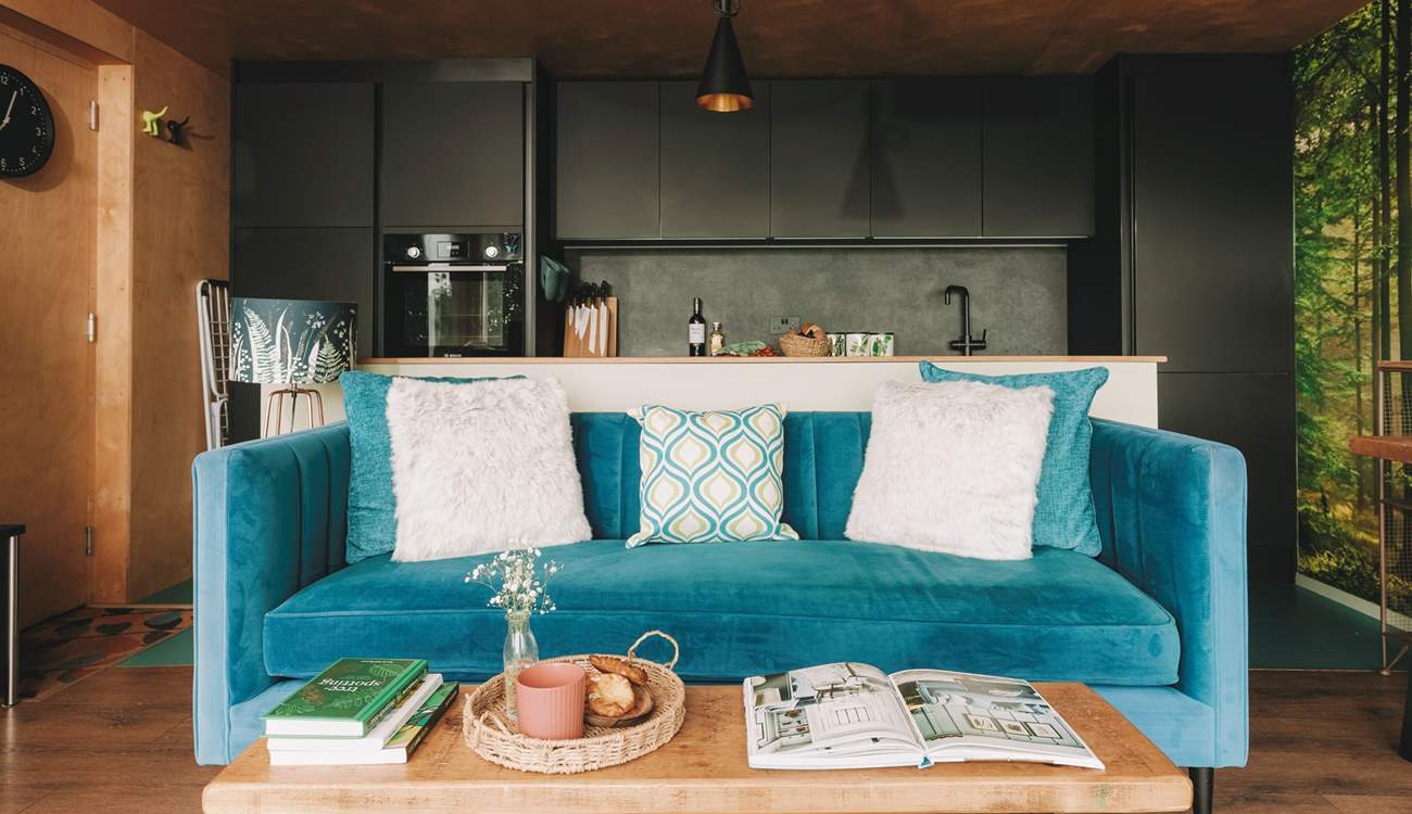 Snuggle into the soft velvet sofa.