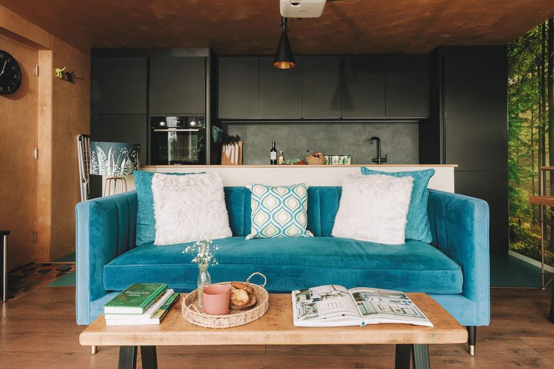 Snuggle into the soft velvet sofa.