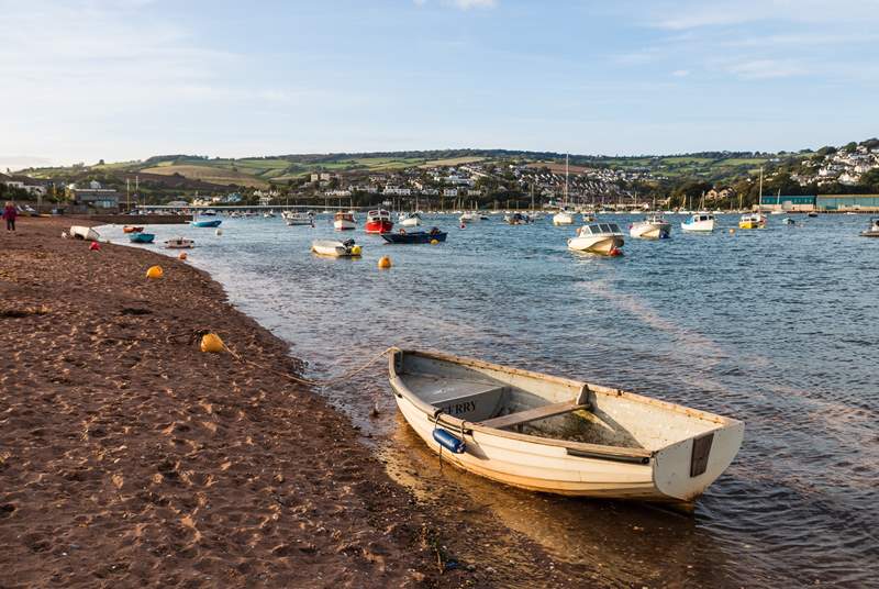 Watch little boats come and go on the sandy shore of Shaldon.