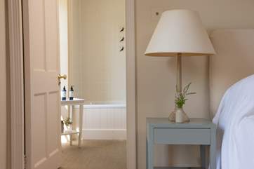 Bedroom two has an en suite bathroom complete with overhead shower.