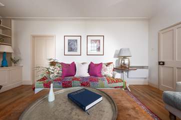 The lovely sitting-room is a dream to relax in.