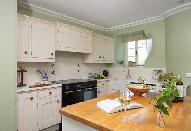 Complete with Belfast sink and range-style cooker the kitchen is the epitome of country living.