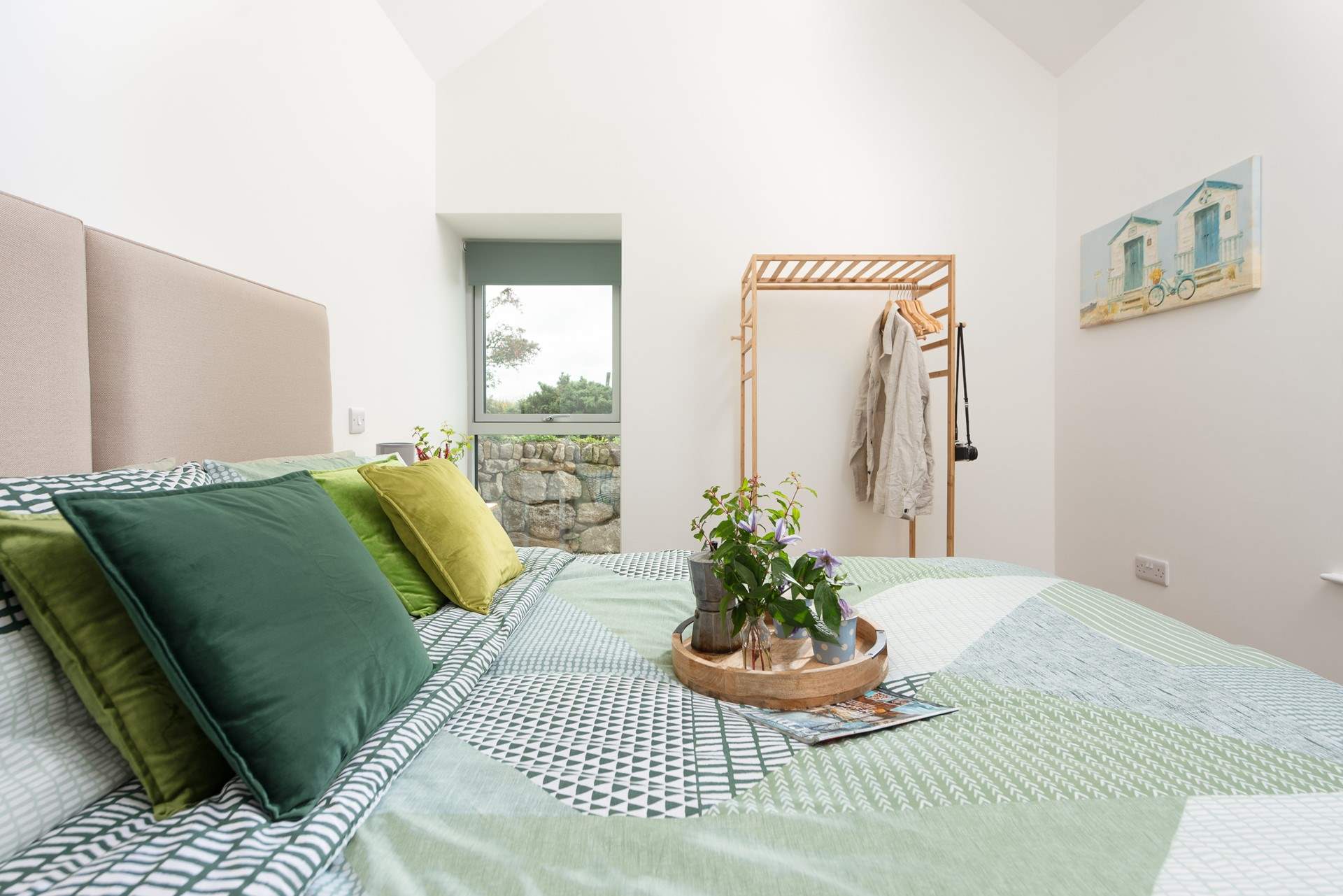 The bedroom has a little hanging space for your clothes. There is also storage in the hallway.