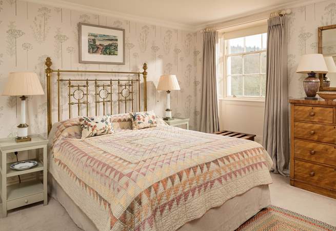 A wonderfully light and airy room, with a king-size bed and views over the surrounding countryside.