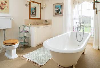Bedroom 2 has a delightful en suite, perfect for a lazy holiday soak with bubbles of either variety. 