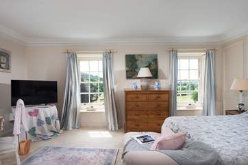The large windows perfectly frame the glorious views of the surrounding countryside.