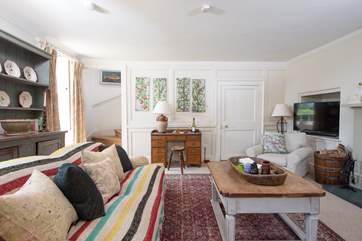 The stairs lead up from the sitting-room to the bedrooms above.
