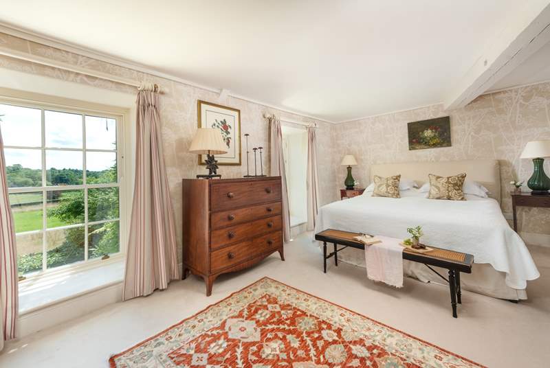 A wonderfully light and airy room, with a huge super-king bed and views over the surrounding countryside.