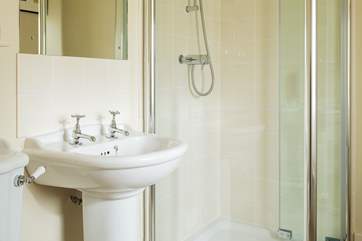 The en suite shower-room, perfect for a refreshing shower after a busy day.