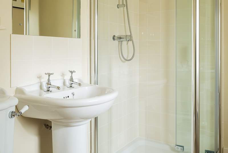 The en suite shower-room, perfect for a refreshing shower after a busy day. 