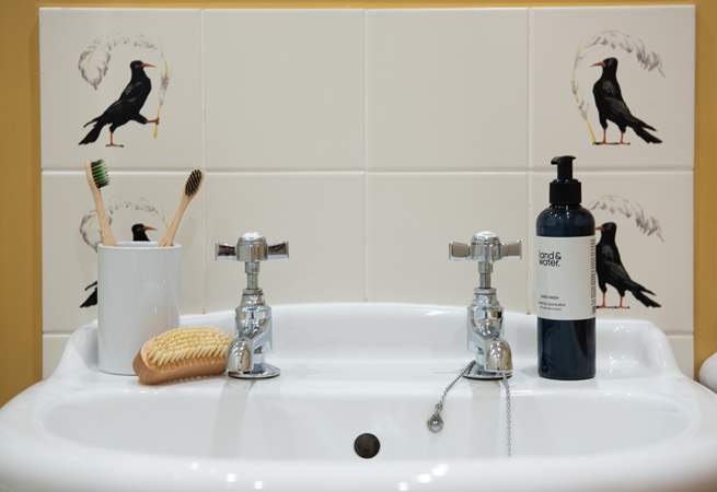 Cornish Choughs are a charming touch on the bathroom tiles.