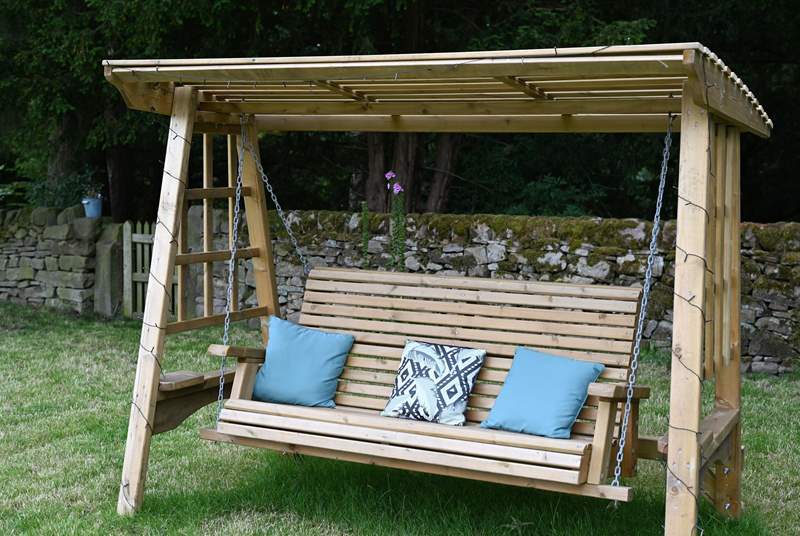 The swing seat is just the spot for your morning brew or evening sundowner.