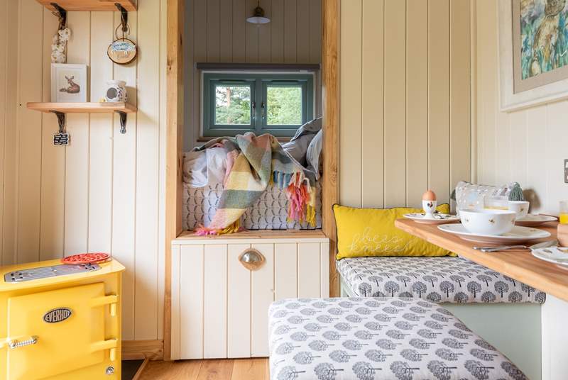 Stay snug in the cabin-style bed.