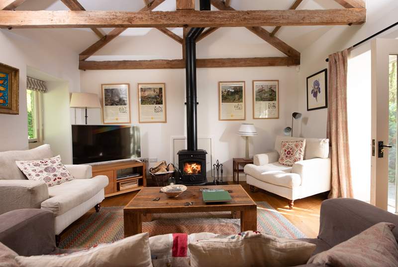 Snuggle up in front of the toasty wood-burner on chillier days.