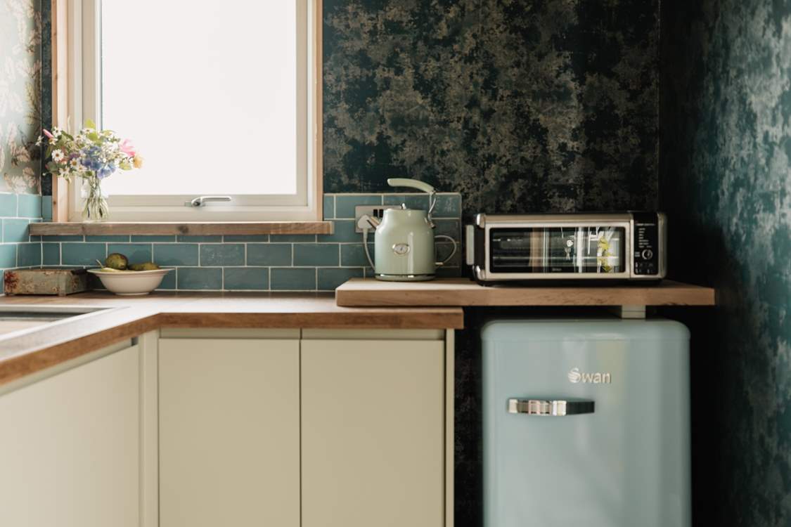 There's a Ninja Foodie that has 8 different cooking functions, including air frying, grilling and toasting.