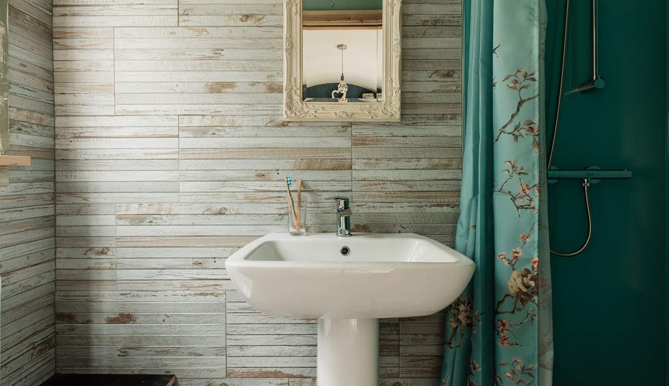 The en suite shower-room is also within the hut. 