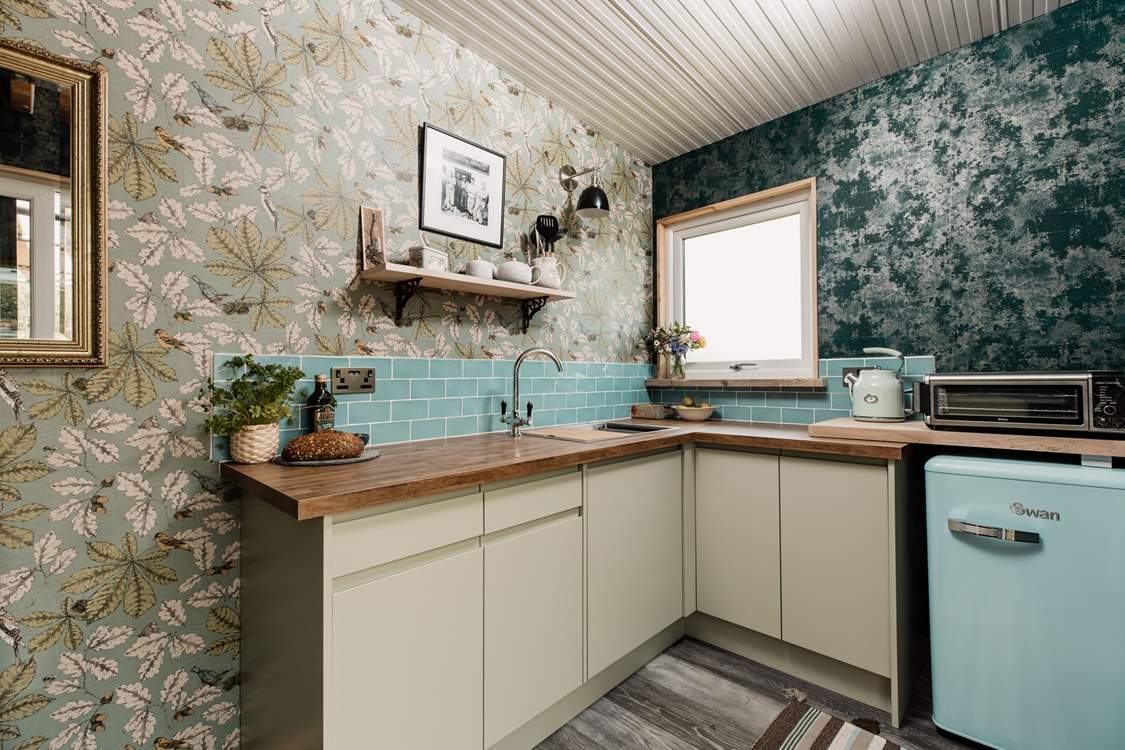 The kitchen is well-equipped with everything you'll need. There's a Ninja Foodi that has eight different cooking functions, including air frying, grilling and toasting.