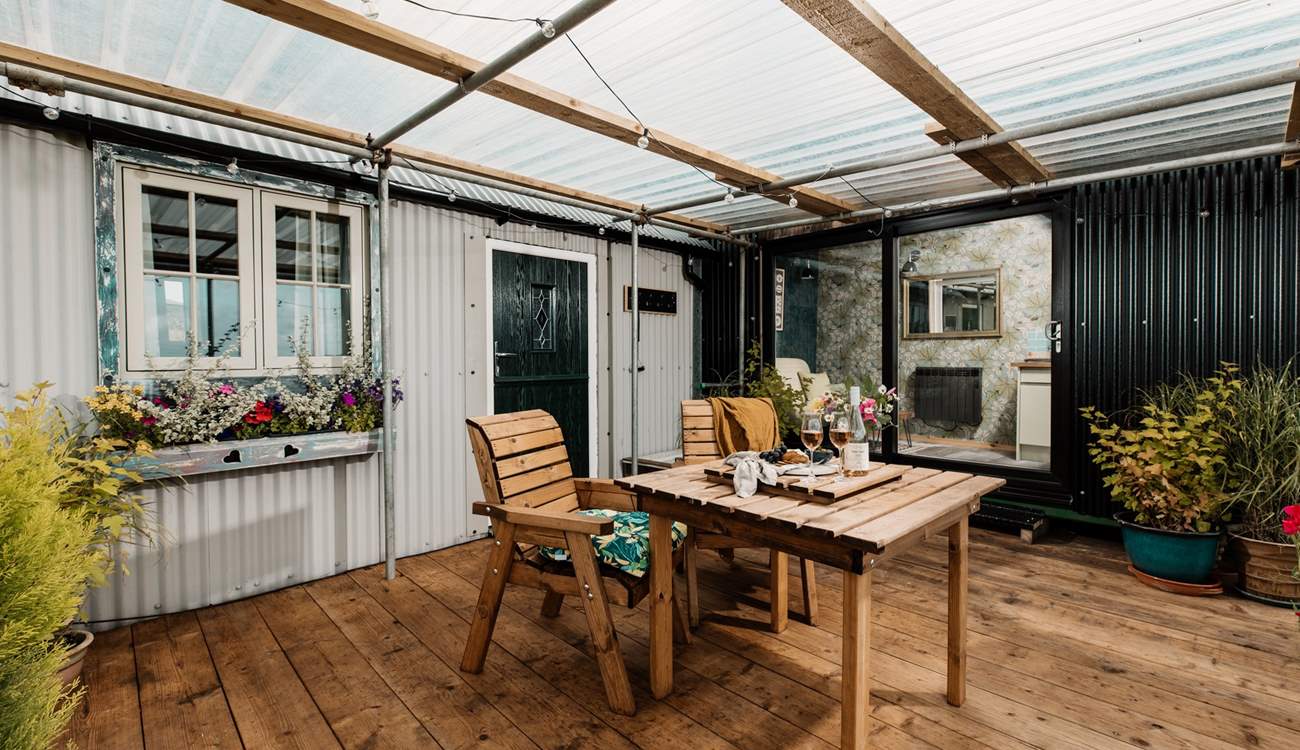 Whatever the weather, the outside space is covered and is perfect for al fresco living!