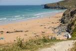 Watergate Bay is just over 15 minutes away. A stunning stretch of golden sand and waves that are popular with surfers. 