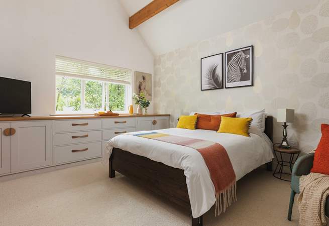 Bedroom 1 is the perfect oasis to escape to at the end of the day with muted calm colours and beautiful crisp linens.