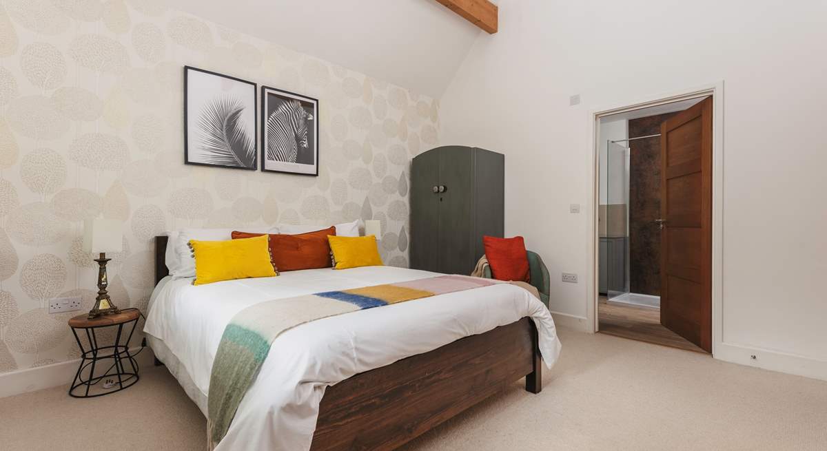 This bedroom benefits from a lovely en suite shower-room with waterfall shower.