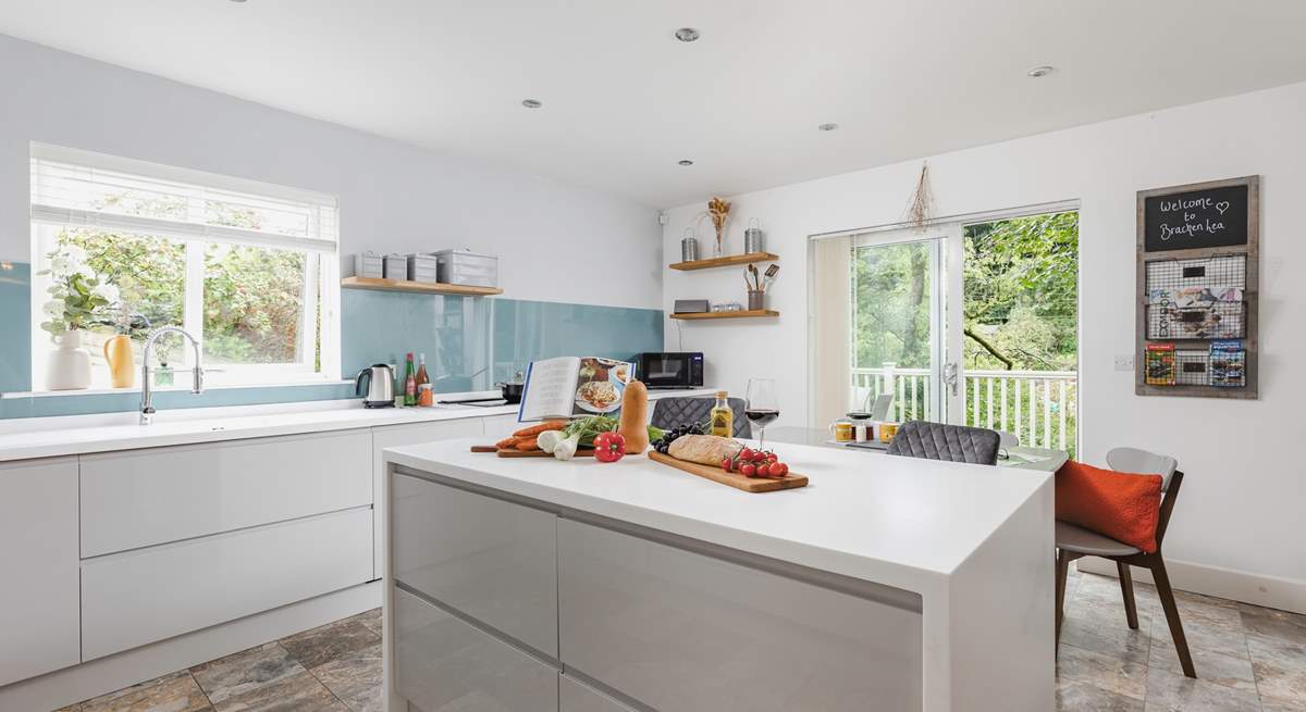 The kitchen/diner floods with light with patio doors opening on to the terrace.