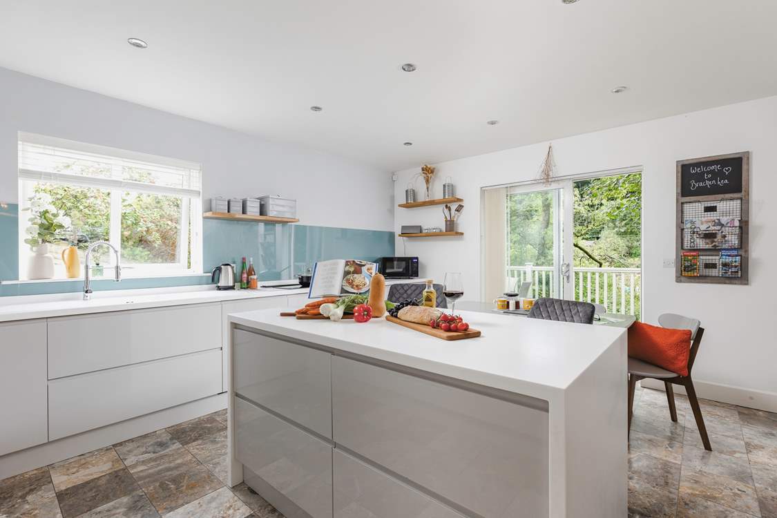 The kitchen/diner floods with light with patio doors opening on to the terrace.