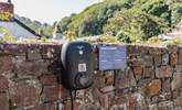 You will find the EV car charging point on the wall. - Thumbnail Image