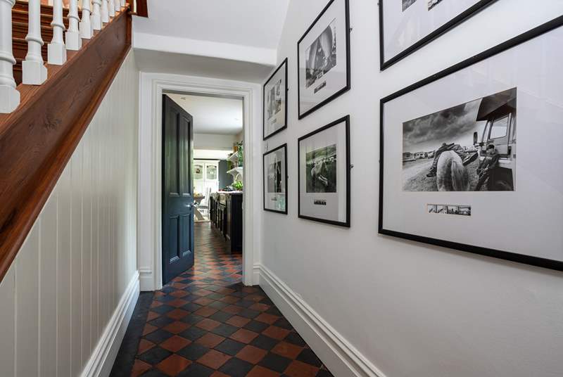The hallway guides you into the large and beautifully designed kitchen.
