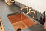 And the copper sink, adding luxury to your hidden haven. 