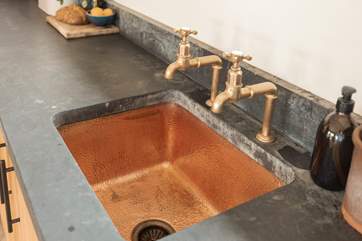 And the copper sink, adding luxury to your hidden haven.