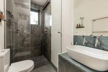 The shower-room is sleek and stylish, and perfectly equipped for freshening up after a day of adventures.