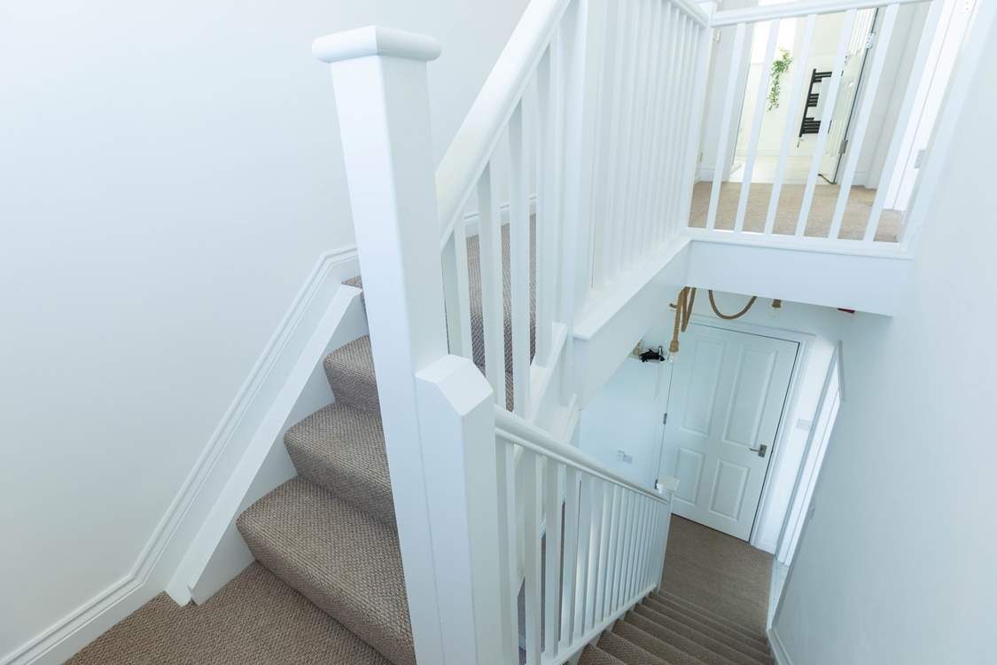 This duplex apartment is laid out across two floors.