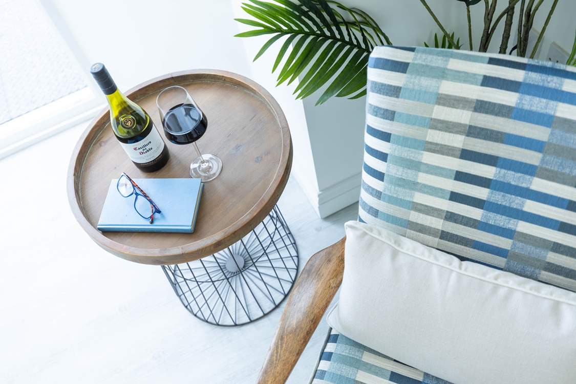 A book and a glass of something tasty.