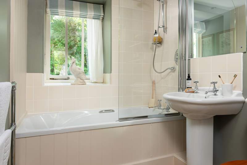 The family bathroom sits next to the twin bedroom on the ground floor.