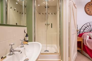 Wake up to a refreshing rainfall shower.
