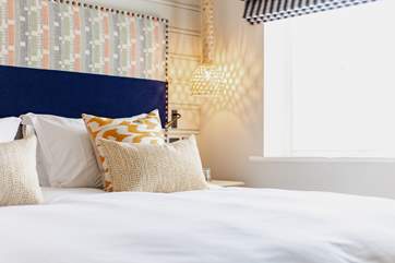 Bright and cheerful bedroom three.
