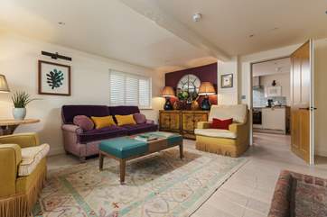 Unwind and put your feet up in the striking sitting-room.