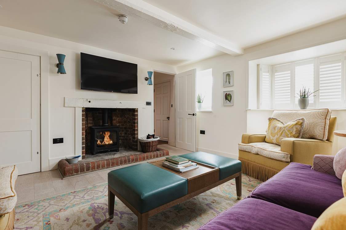 After a day fishing the River Test, sit back and relax in the sitting-room, warming your toes by the wood-burner.