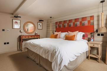 Comfortable super-king double bed in bedroom one. Found at the front of the cottage.