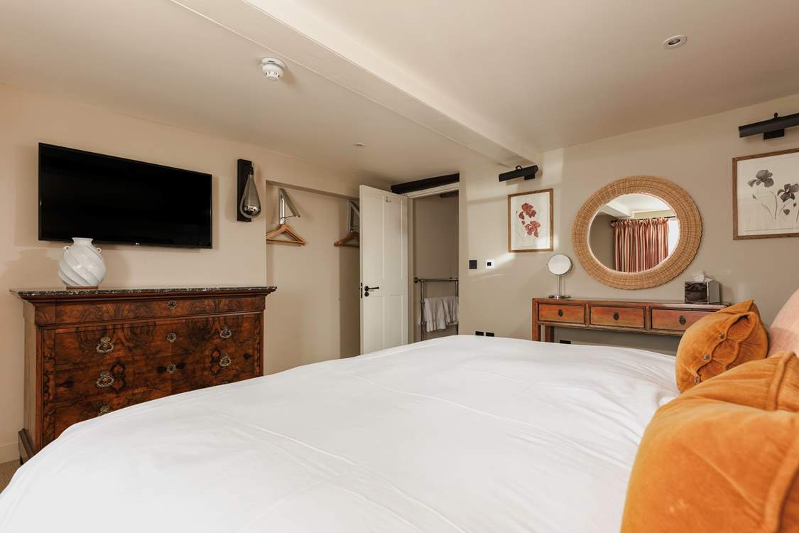 Convenient downstairs bedroom one, with en suite bathroom.